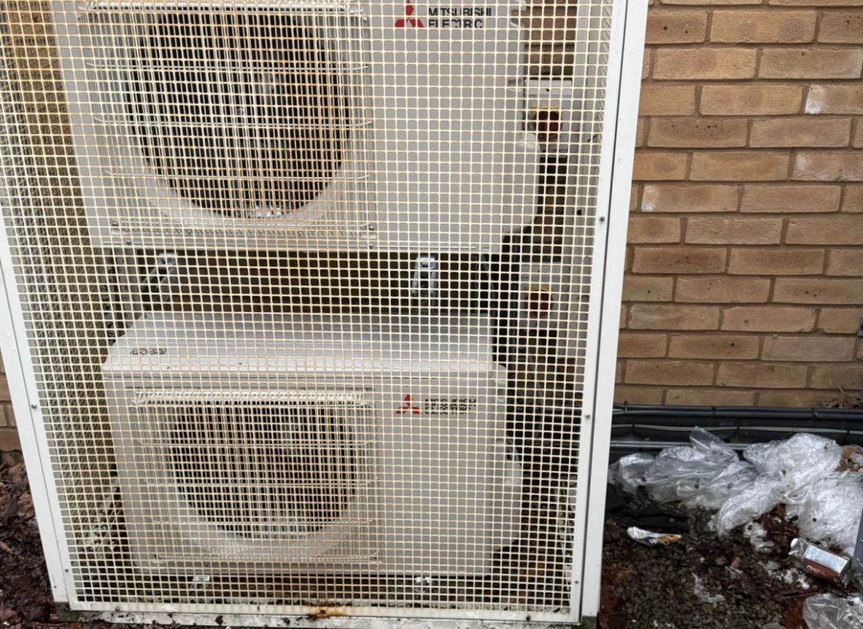 Caged outdoor Mitsubishi units